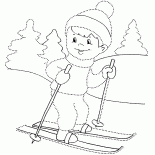 Boy skiing in the woods